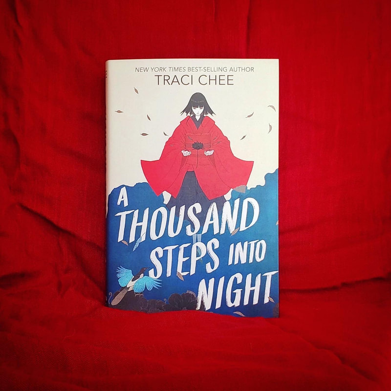 hardcover of A Thousand Steps into Night on a red cloth background