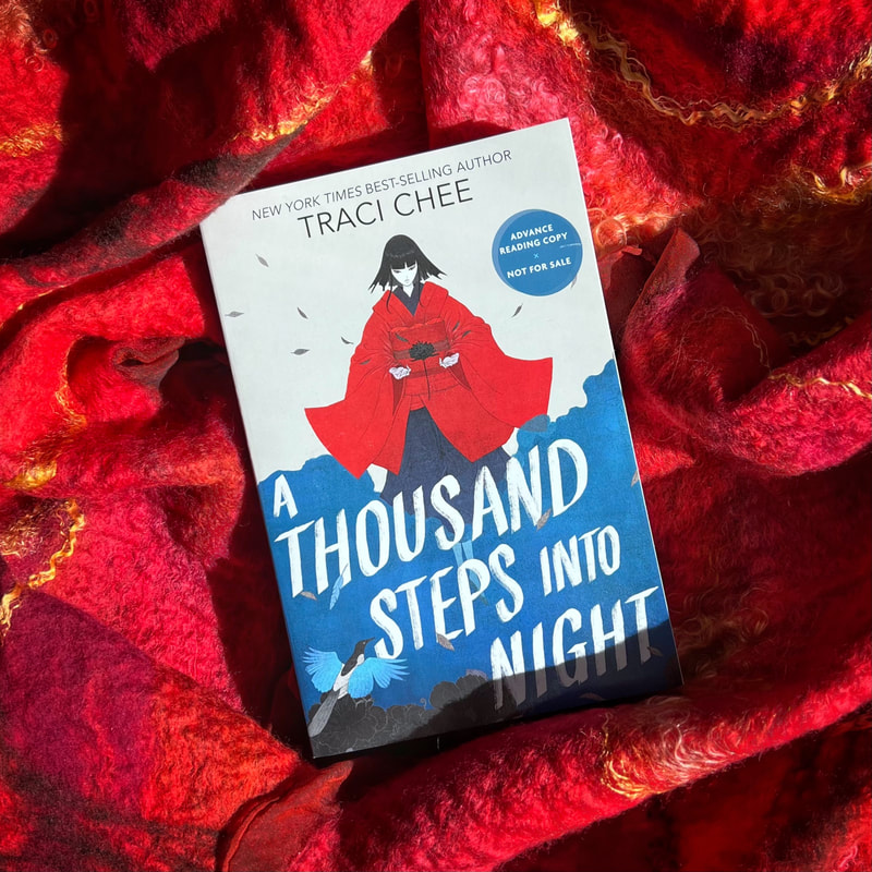 ARC of A Thousand Steps into Night by Traci Chee on a red background